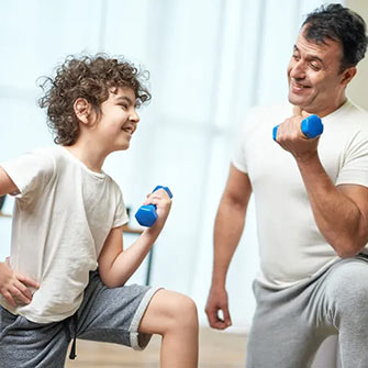 father and son working out together
