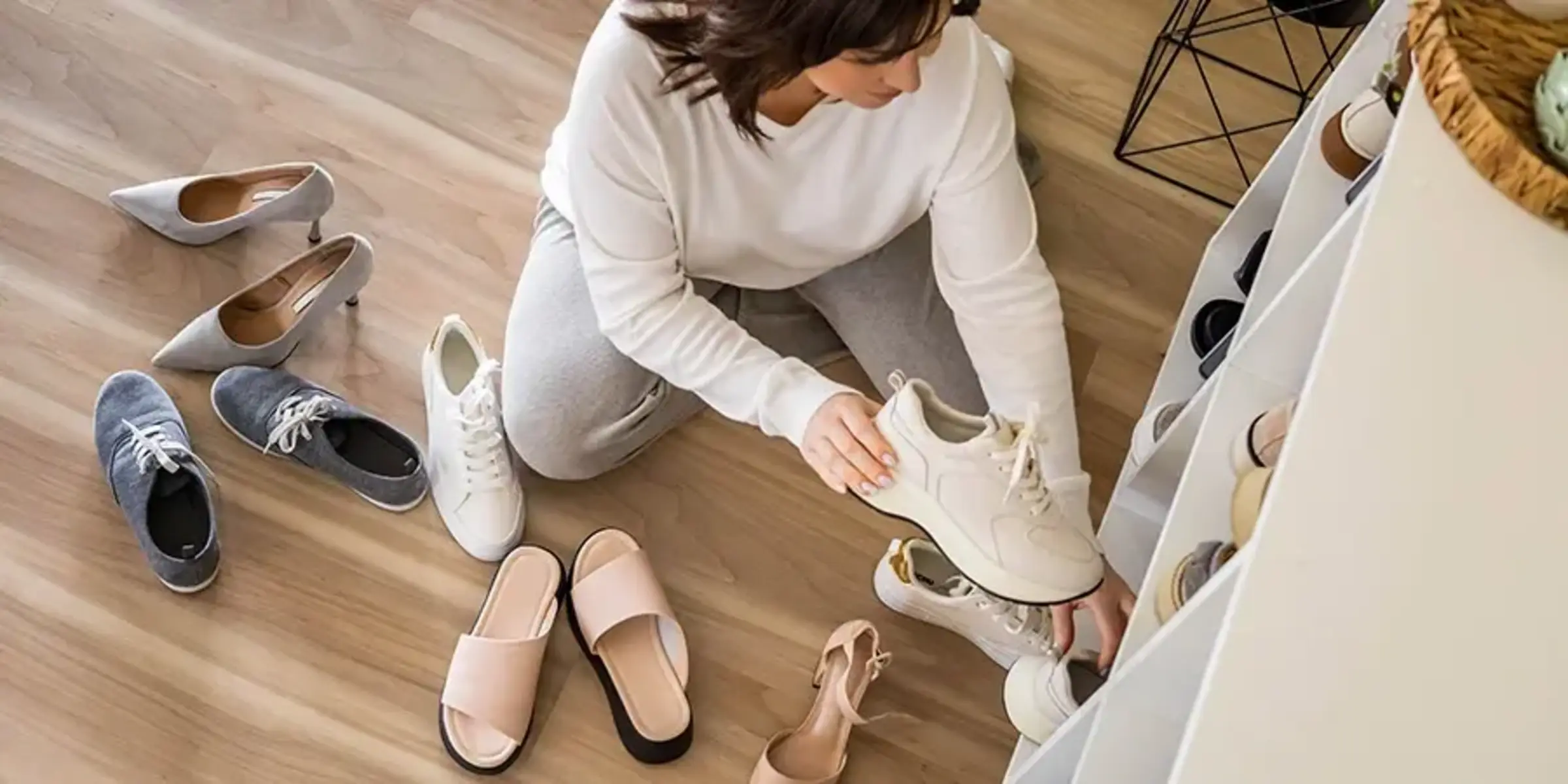 woman checking for worn out shoes