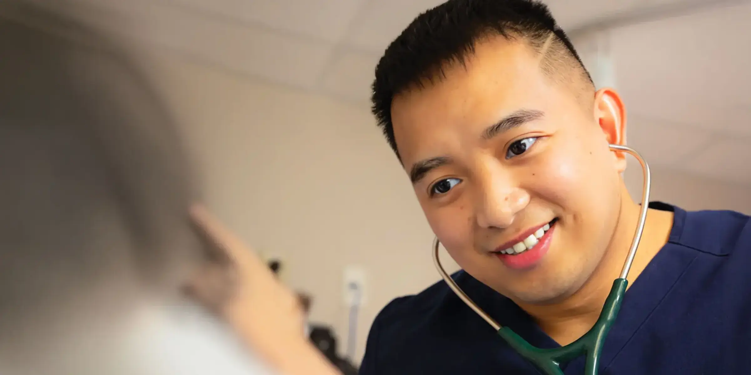 Nurse checks on patient