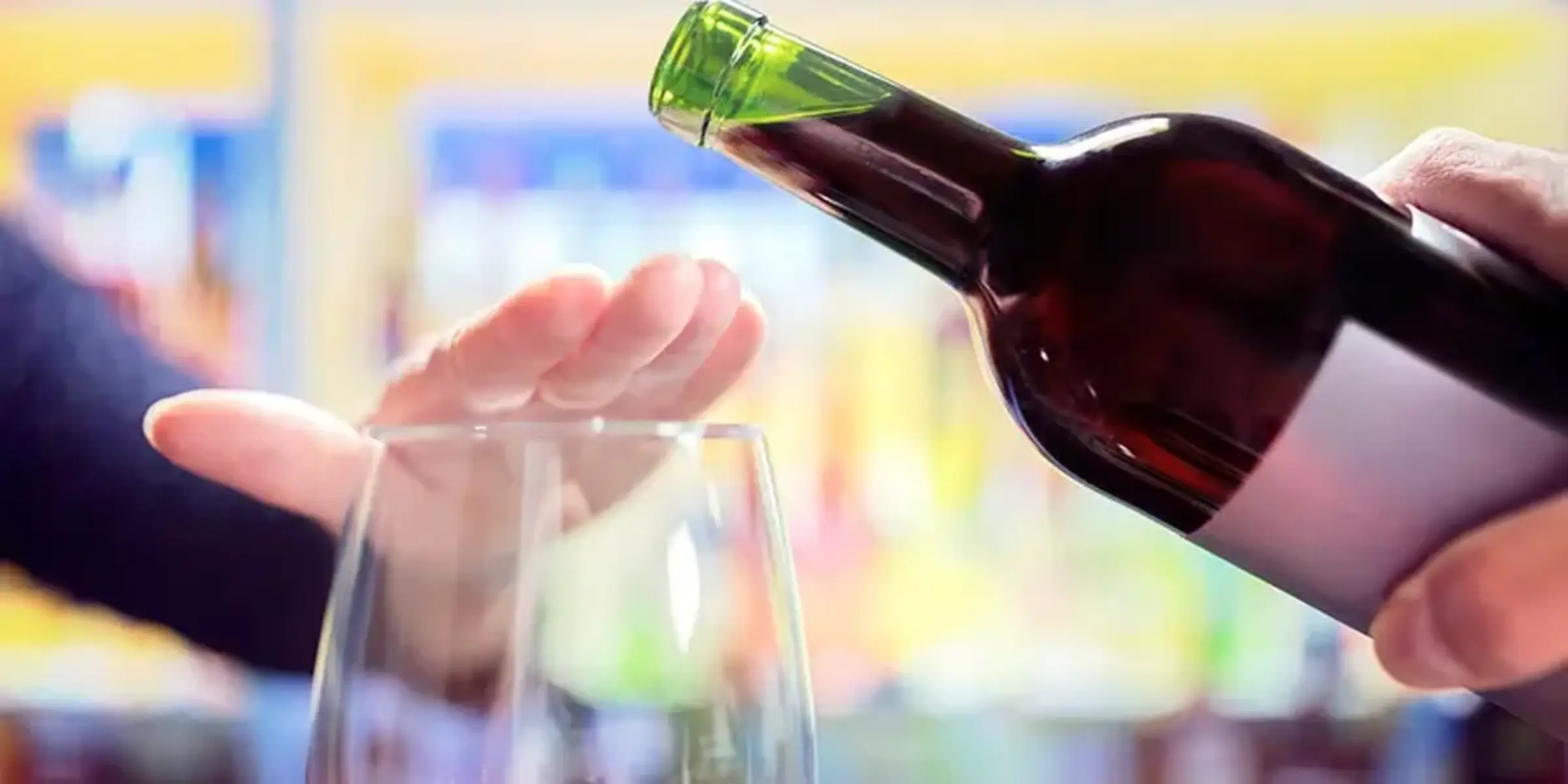 Womans hand rejecting alcohol no heavy winter drinking