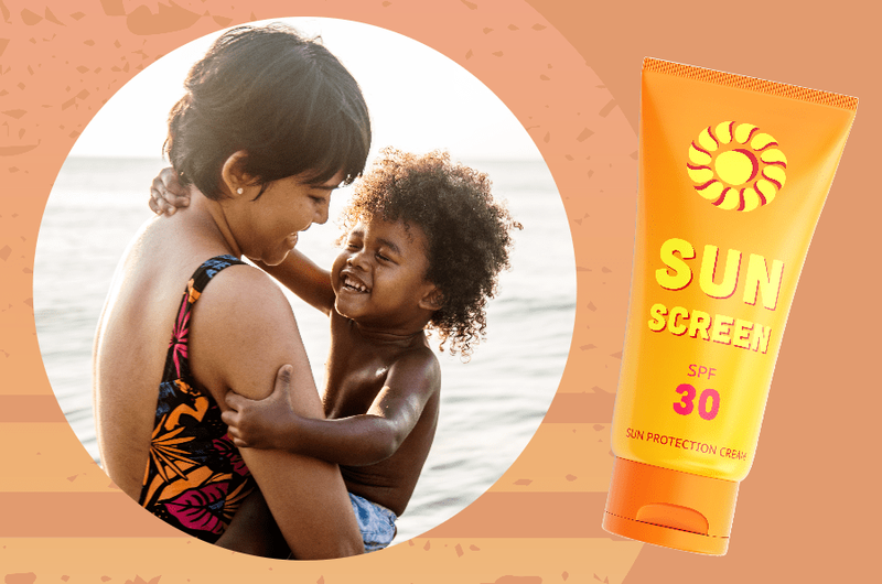 mother holding child and sunscreen bottle