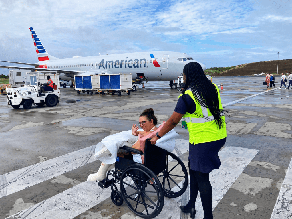 Renee is wheeled to our flight to Miami