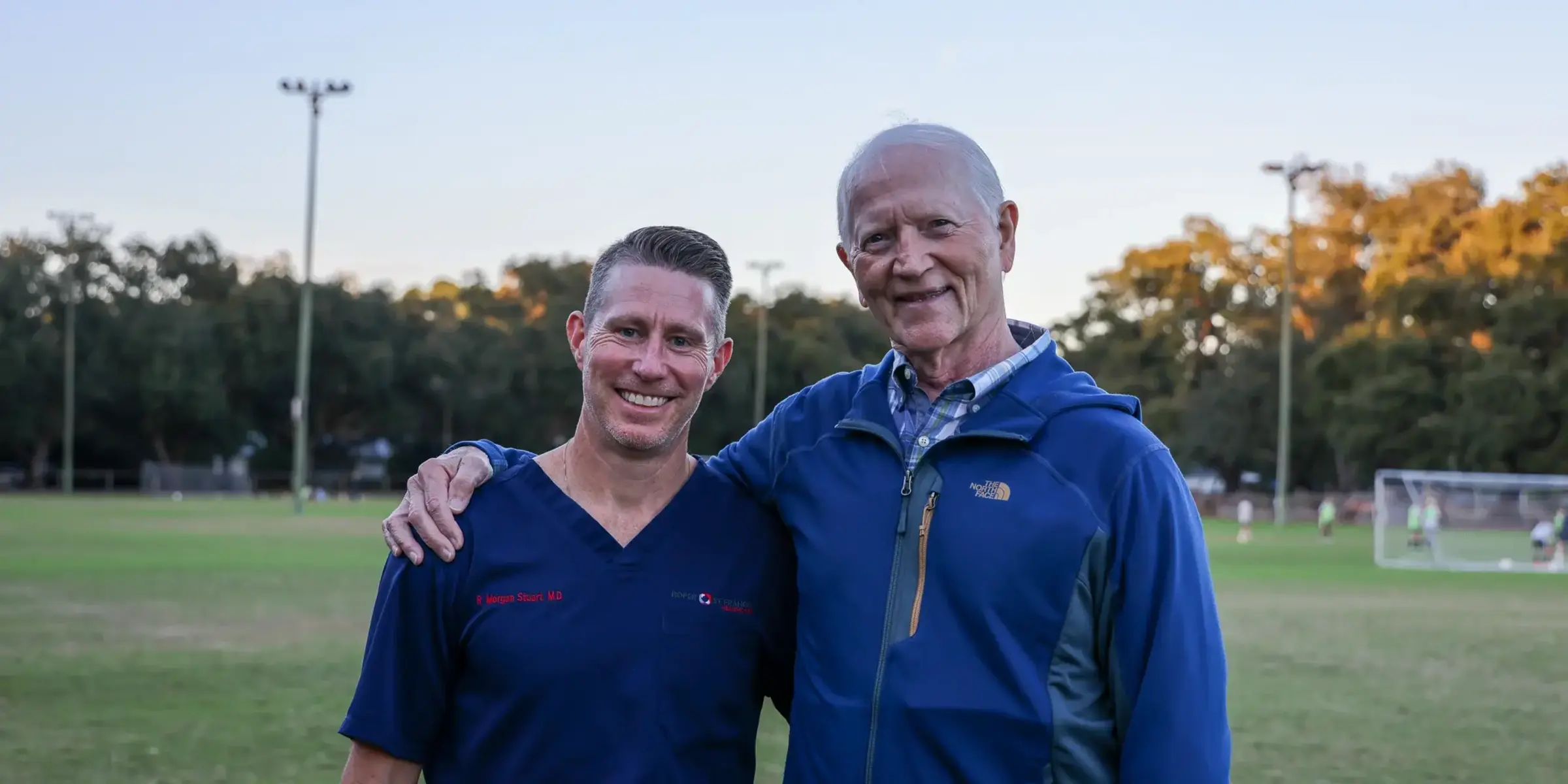 Dr. Morgan Stuart (left) with his childhood soccer coach Bob Czarniecki (right)