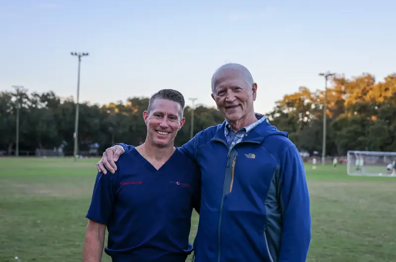 Dr. Morgan Stuart (left) with his childhood soccer coach Bob Czarniecki (right)