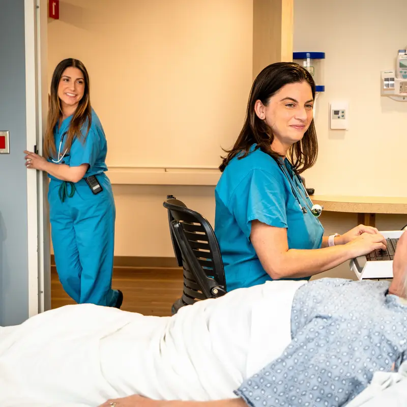 nurse checking vitals of patient