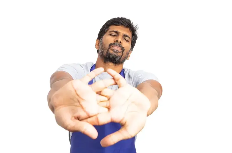 man stretching cracking his knuckles
