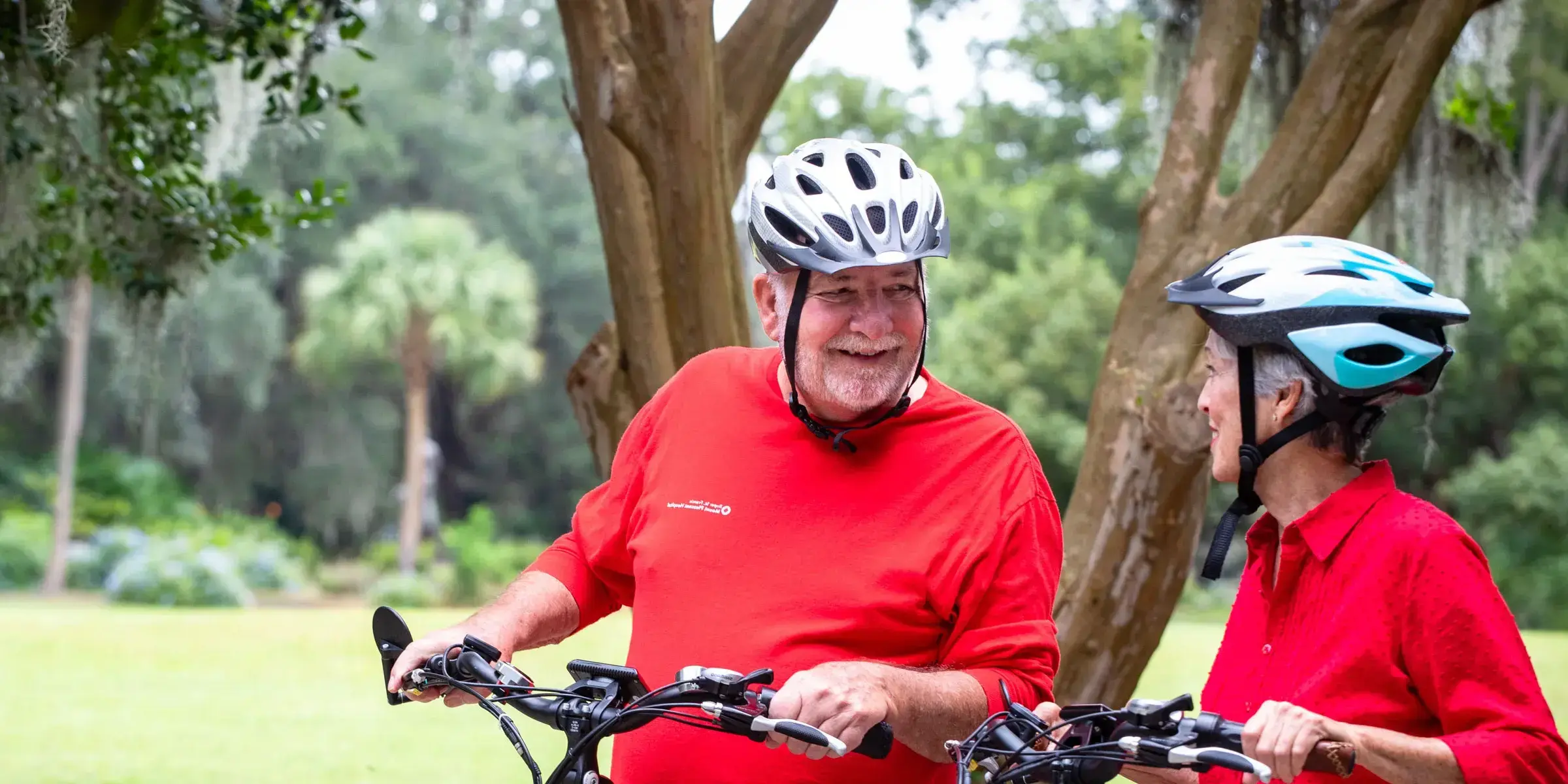 Older couple bike in Hampton Park