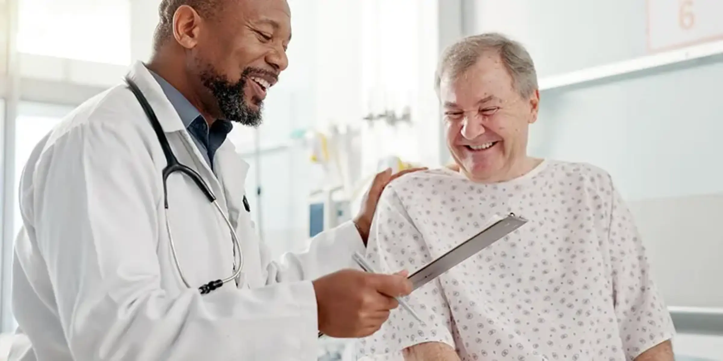 patient with doctor discussing colonoscopy procedure