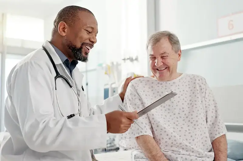 patient with doctor discussing colonoscopy procedure