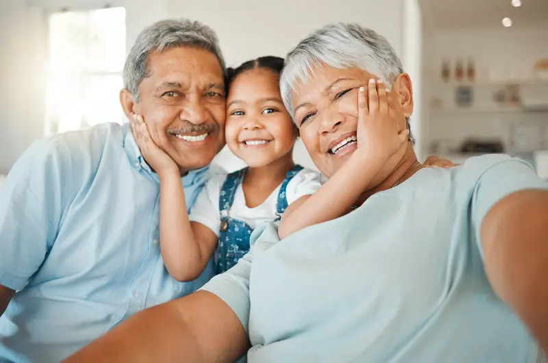 grandparents with grandchild