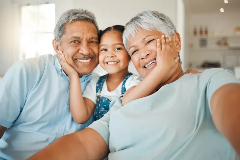 grandparents with grandchild