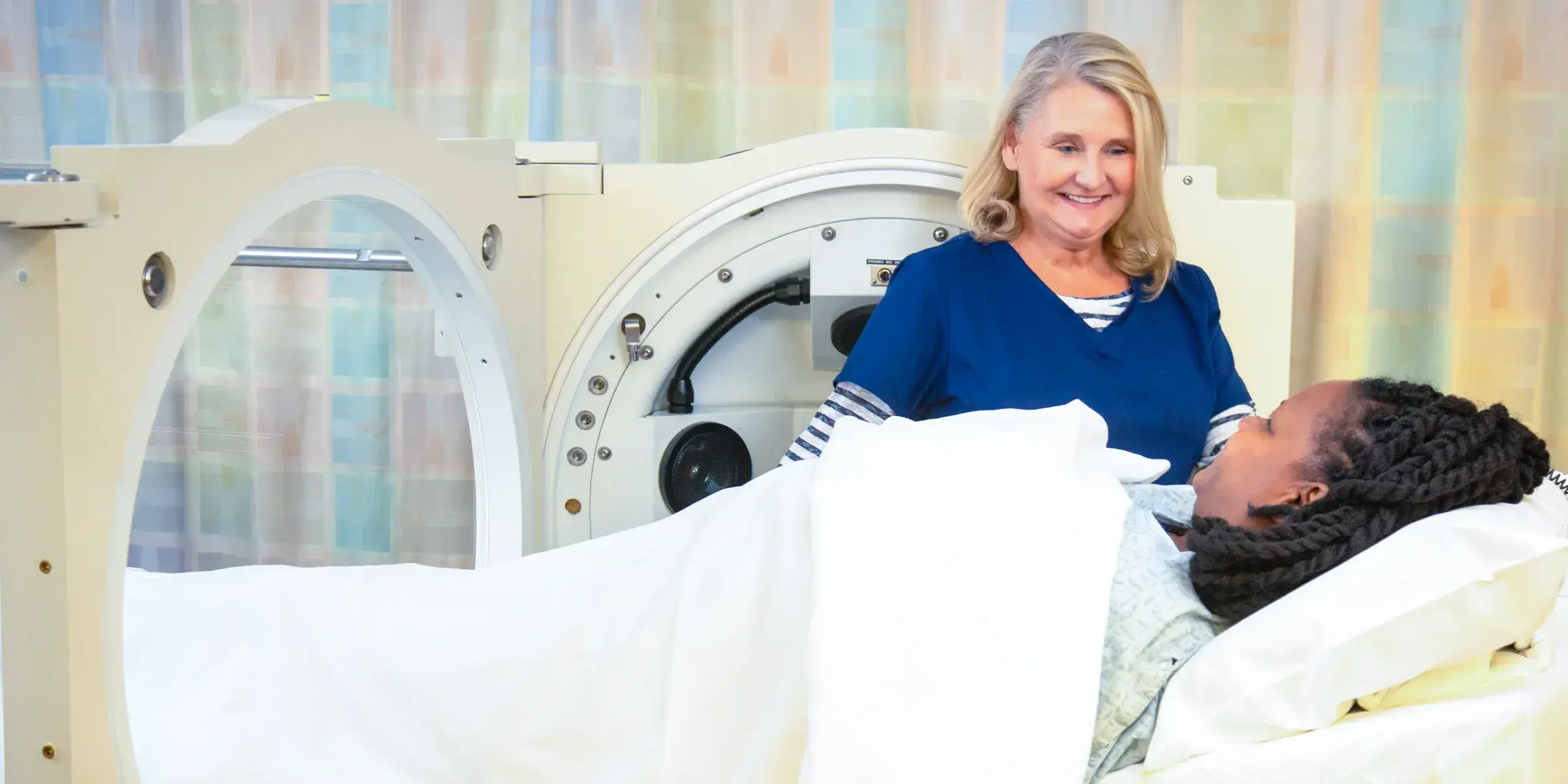 Patient in hyperbaric chamber