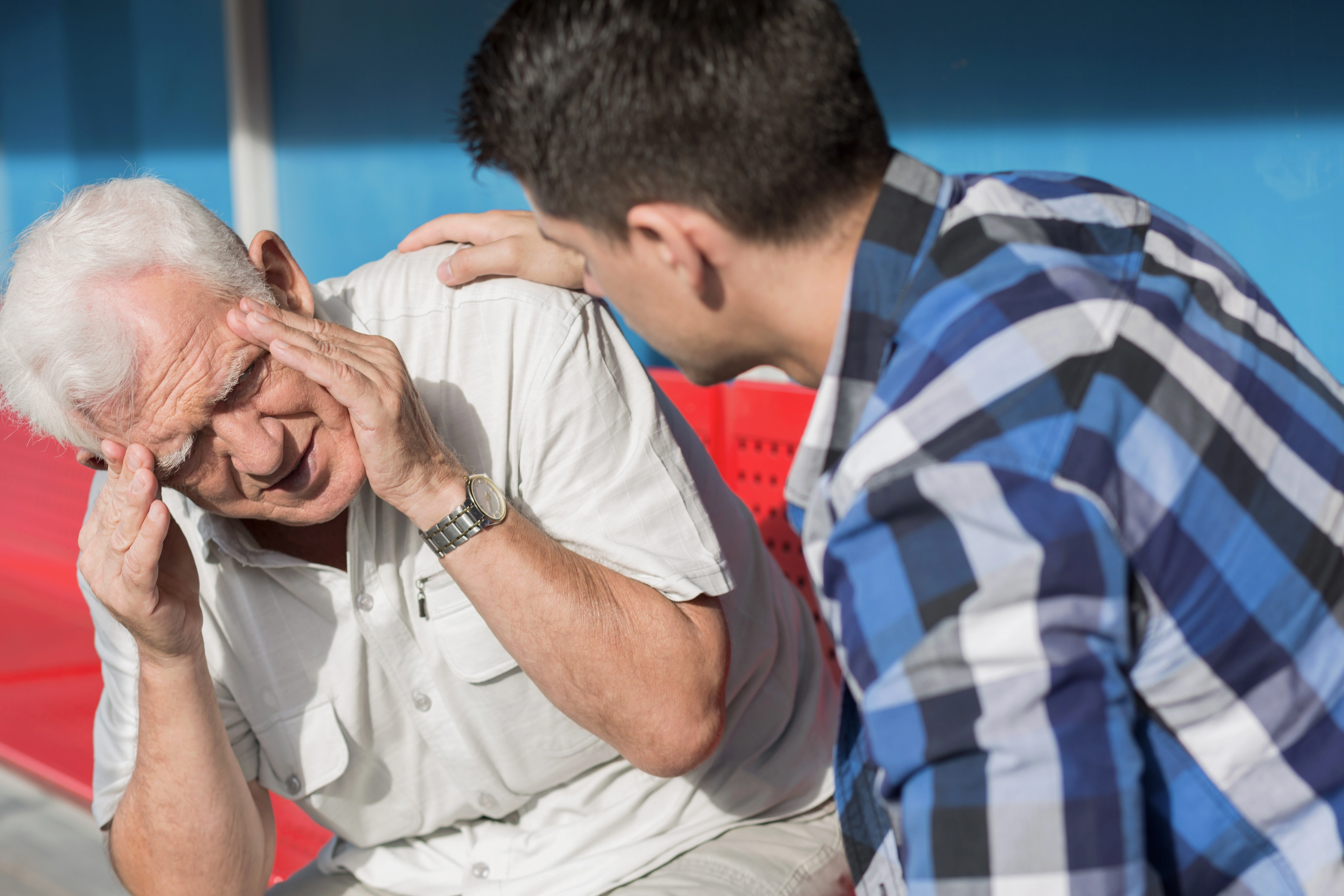 Man holding head in pain
