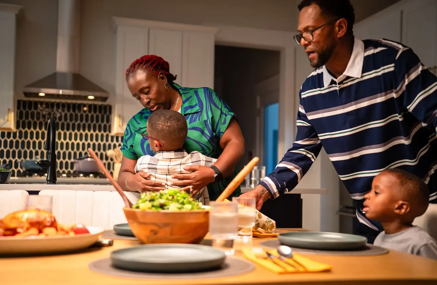 family getting ready for dinner