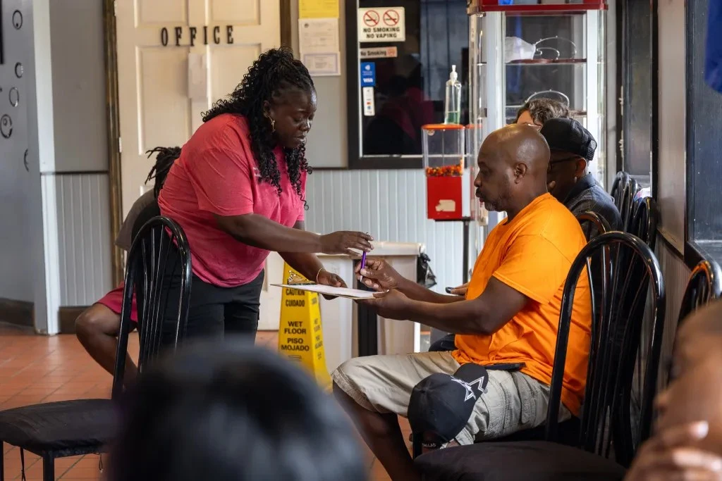 man at barber shop signs up for screening