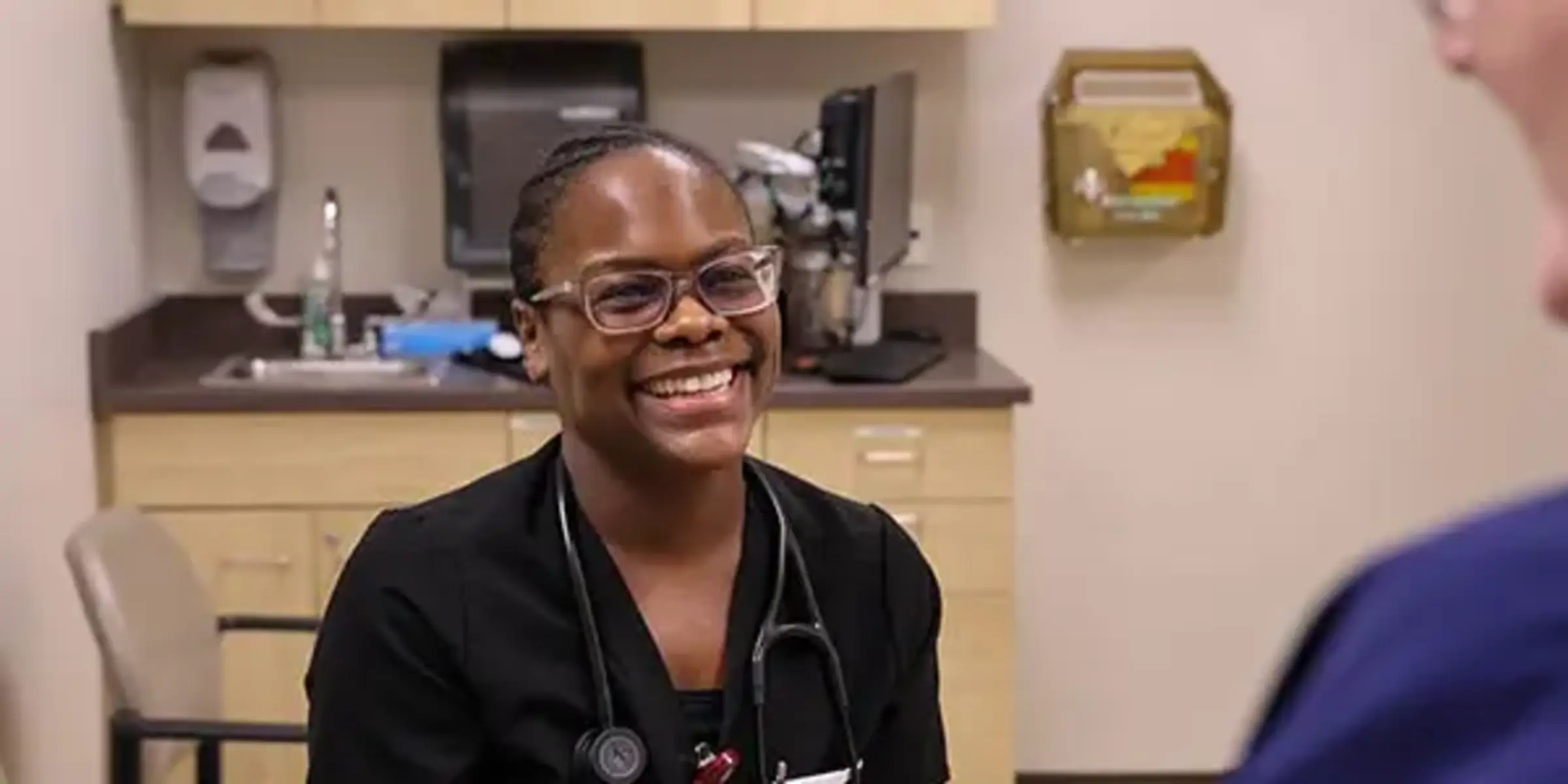 Dr. Kristen Miller with patient
