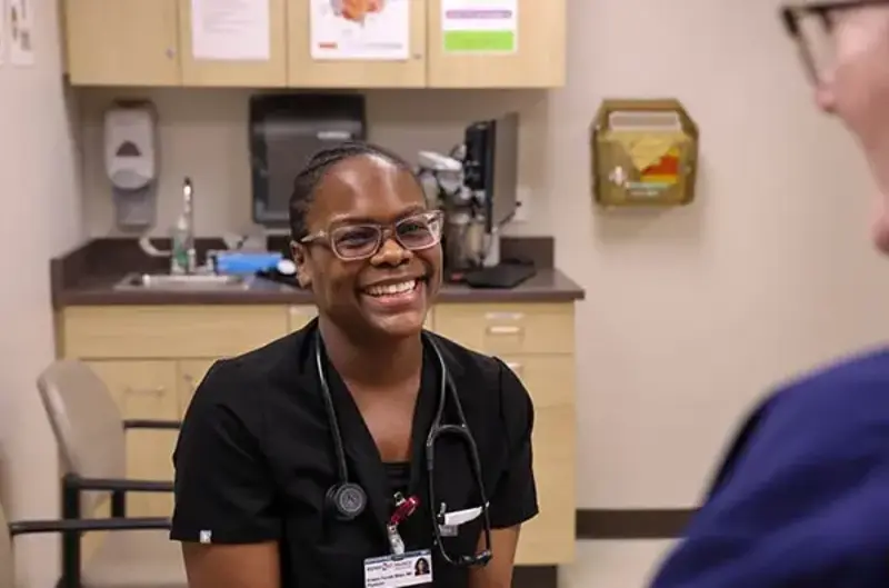 Dr. Kristen Miller with patient
