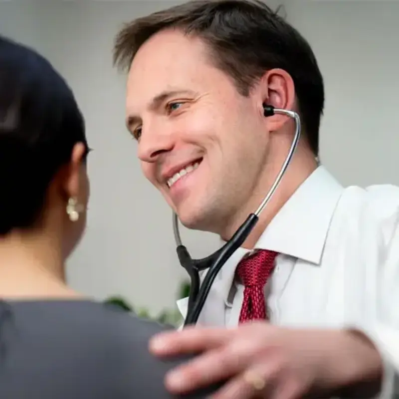 doctor Flandry comforts patient