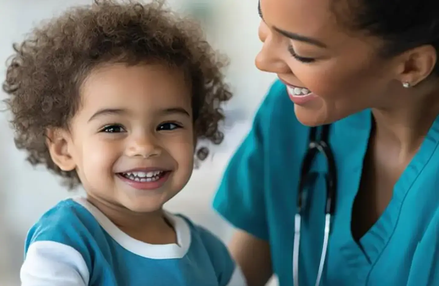 Childrens Unit Pediatric Care nurse with toddler