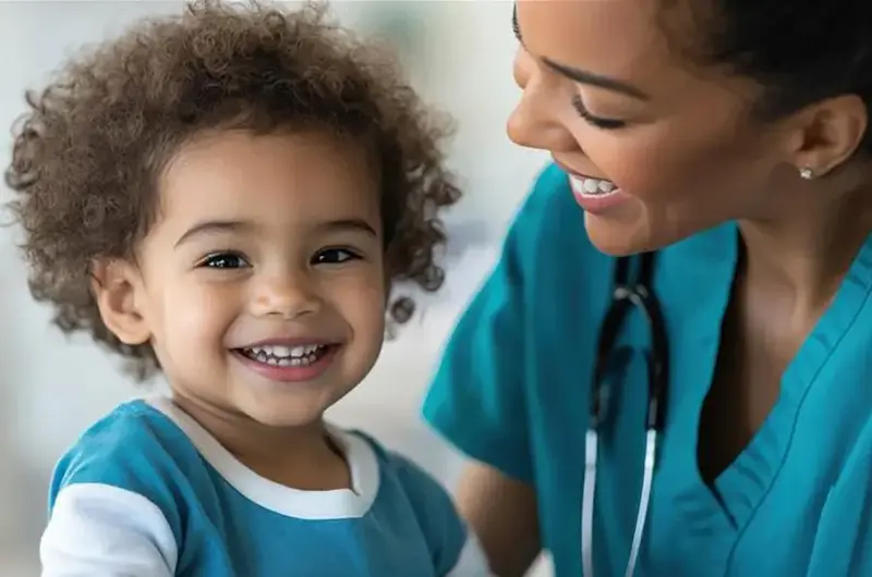 Childrens Unit Pediatric Care nurse with toddler