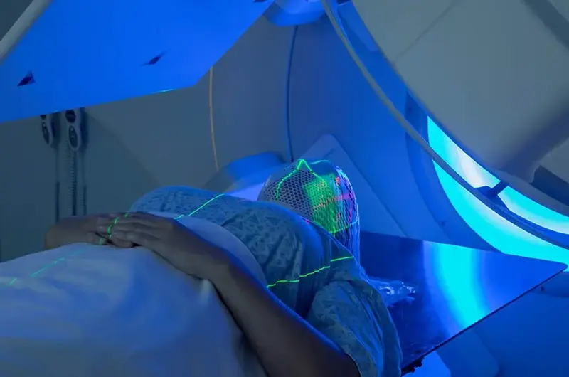 woman receiving radiation treatment