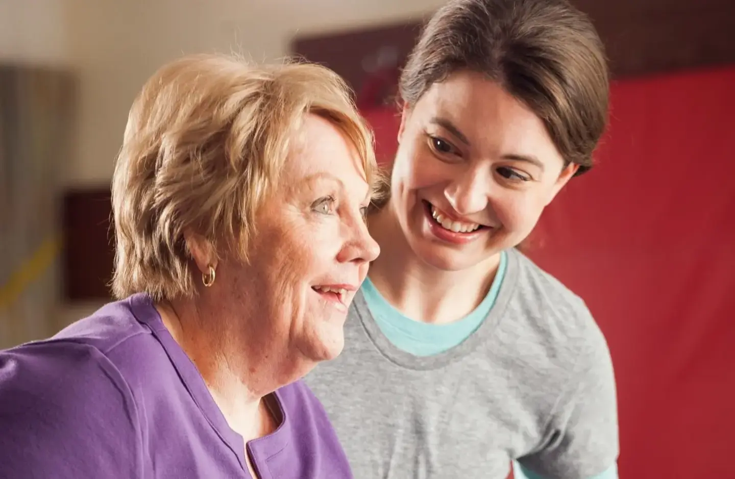 Rehab specialist helps patient walk