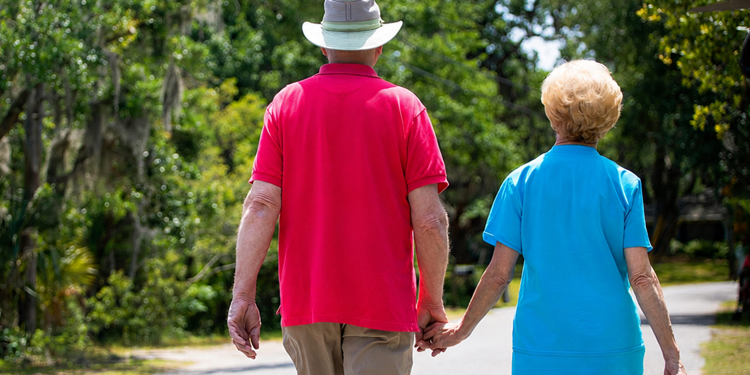 Couple holding hands walking