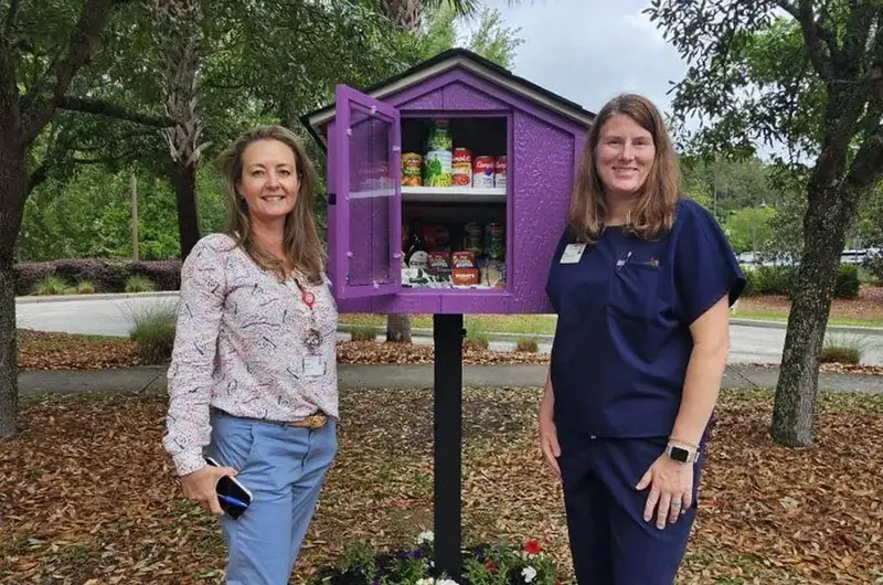 nurses standing by blessing box