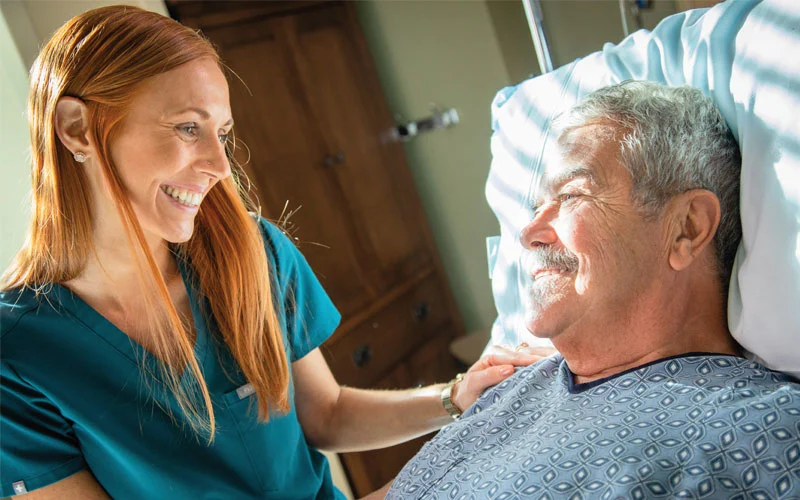 Nurse-with-patient-bedside