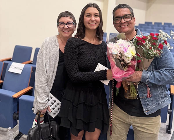 Mia Chaveco with husband at daughter college graduation
