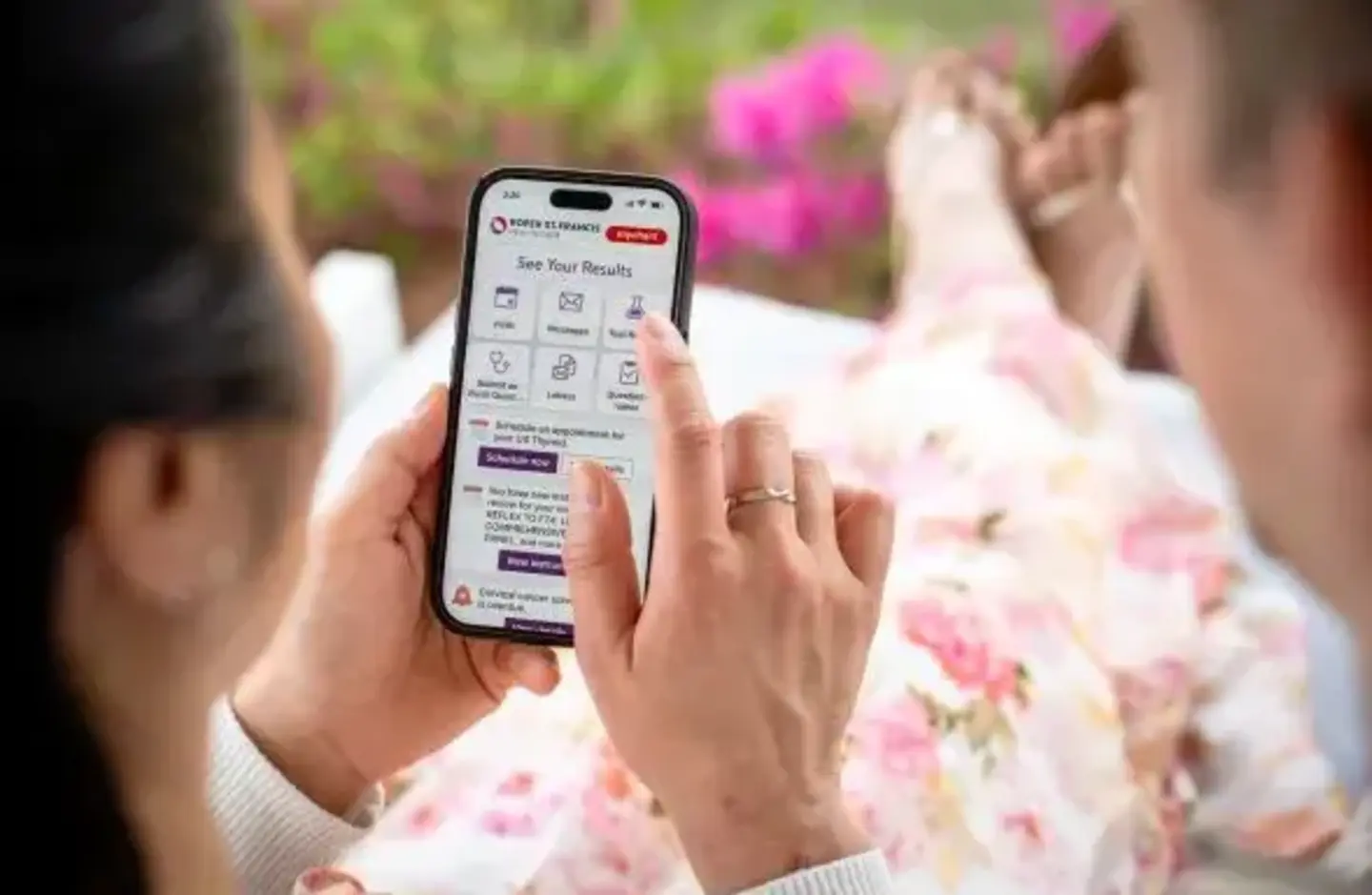 Woman uses MyChart on phone