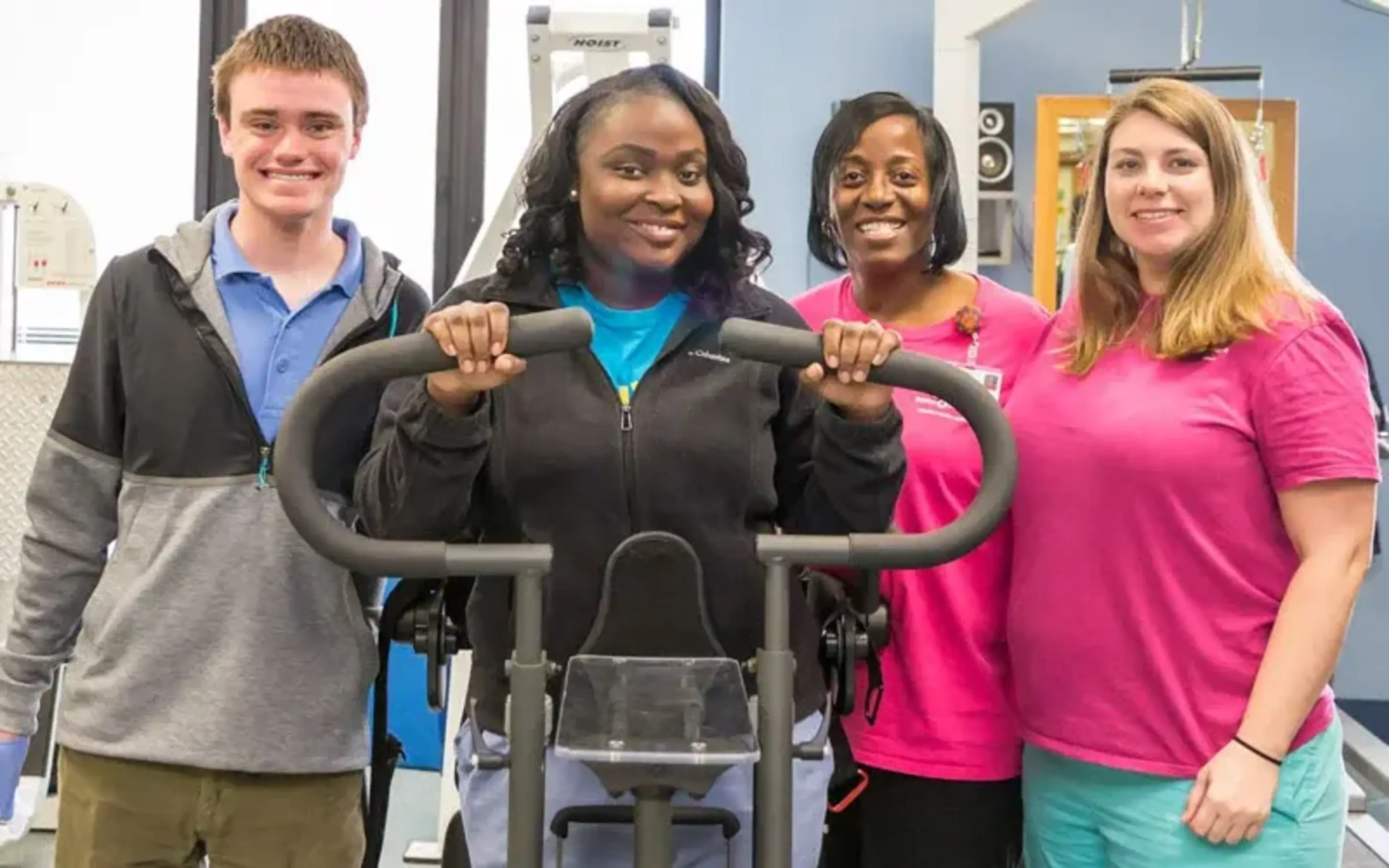 Caregivers in rehab gym