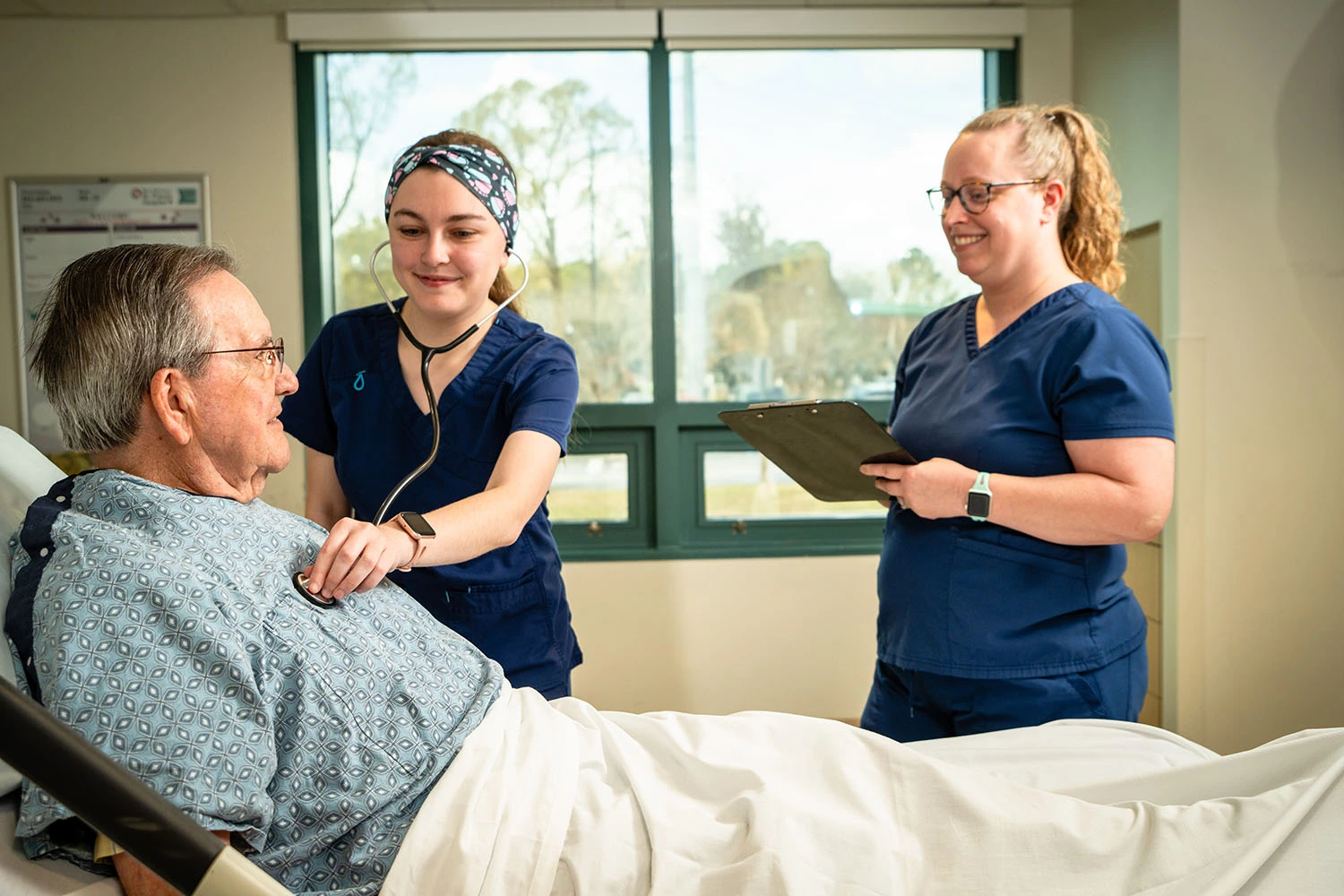 new nurse with patient