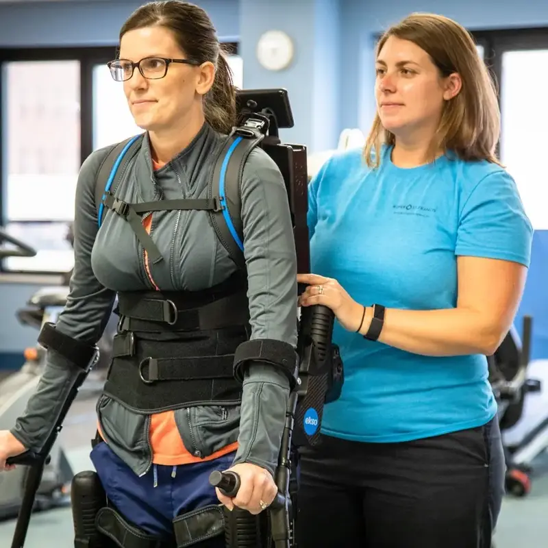 Patient uses exoskeleton