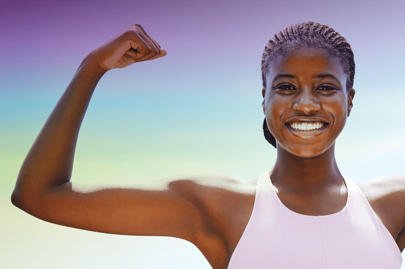young girl flexing her muscle arms