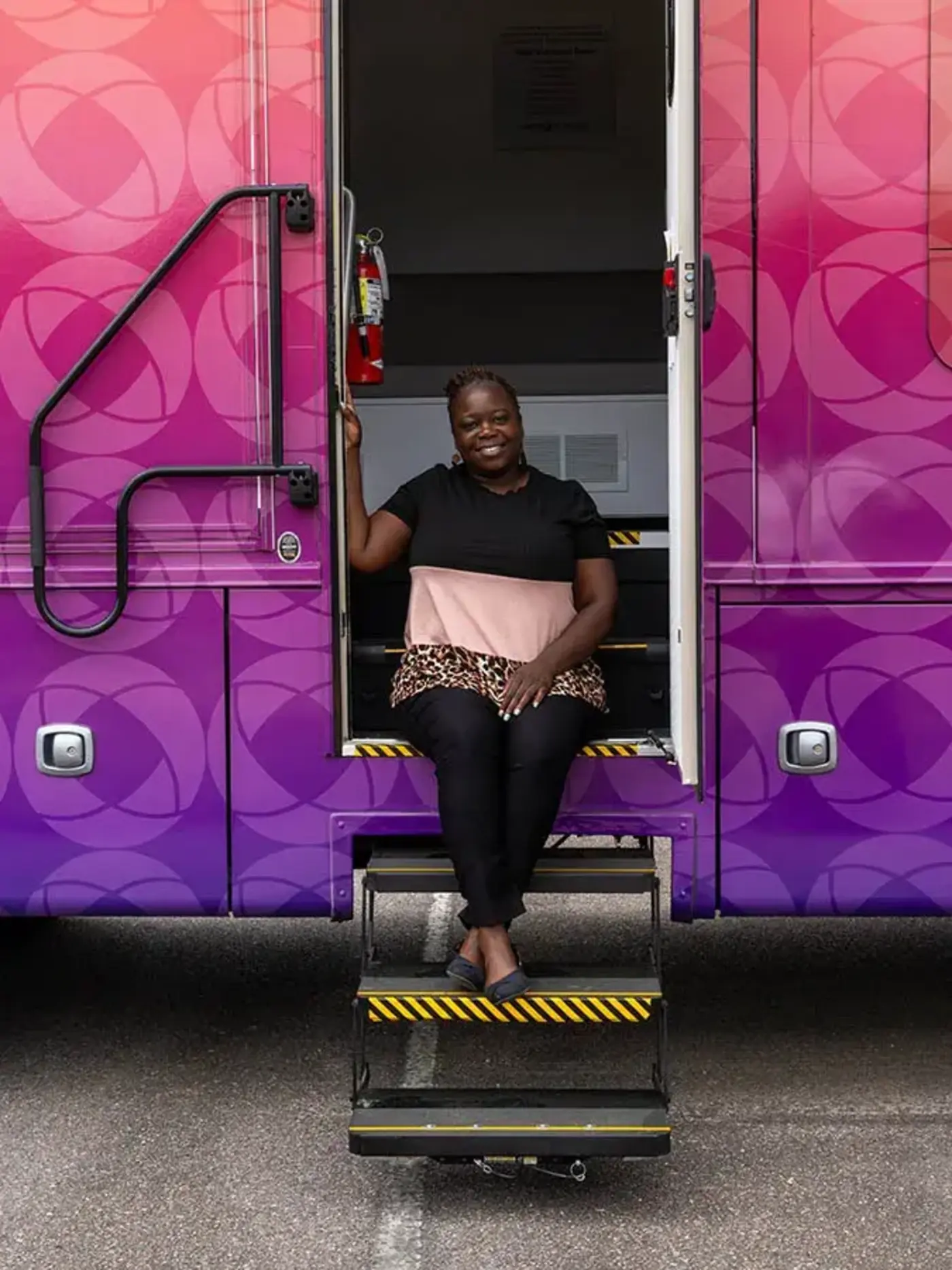 Sharonda Stokes sits in doorway
