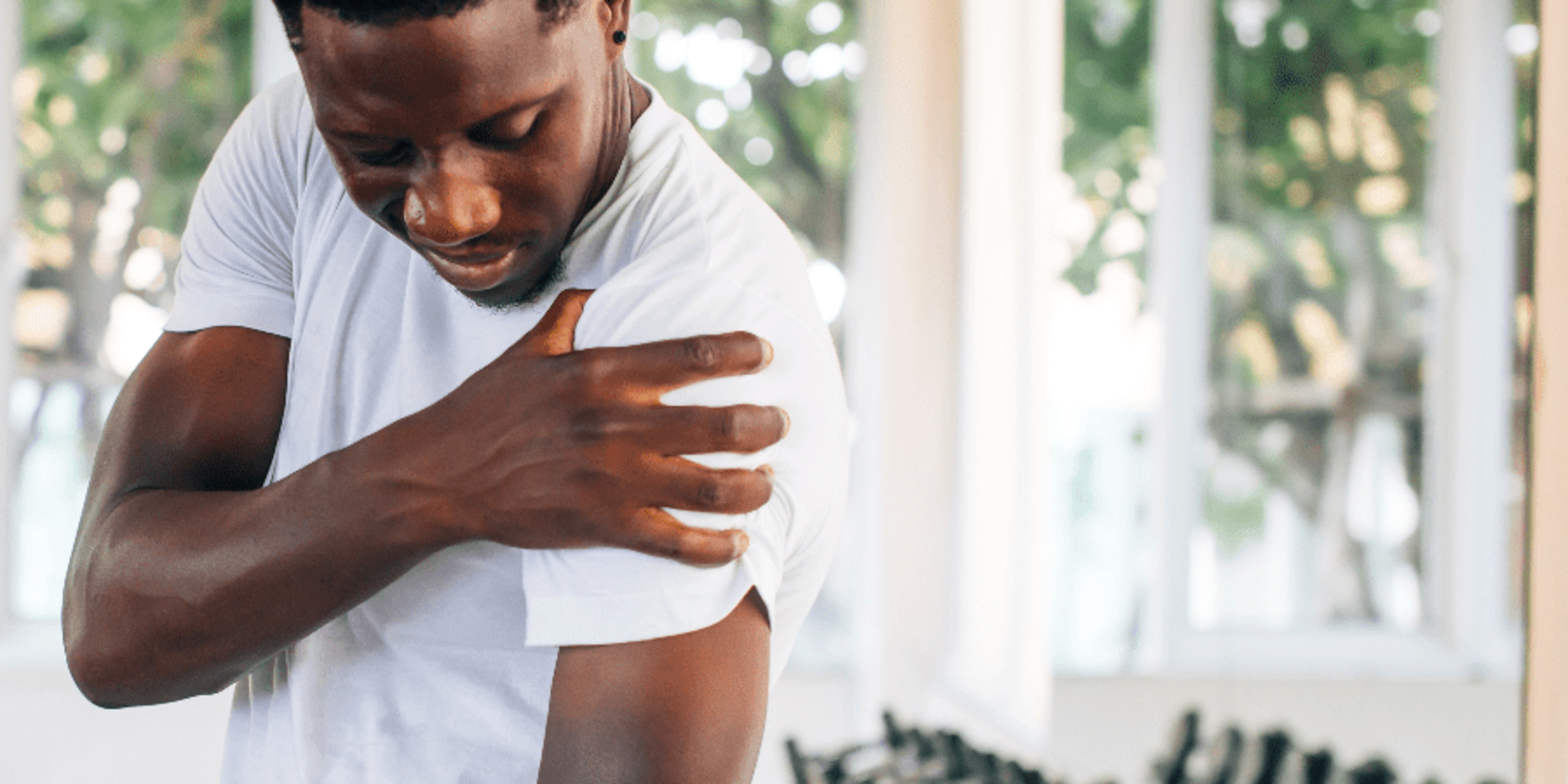young man with rotator cuff injury