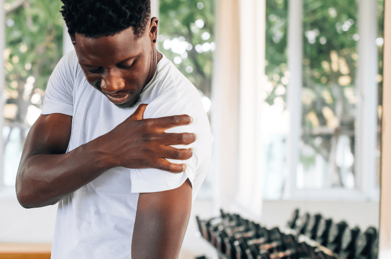 young man with rotator cuff injury