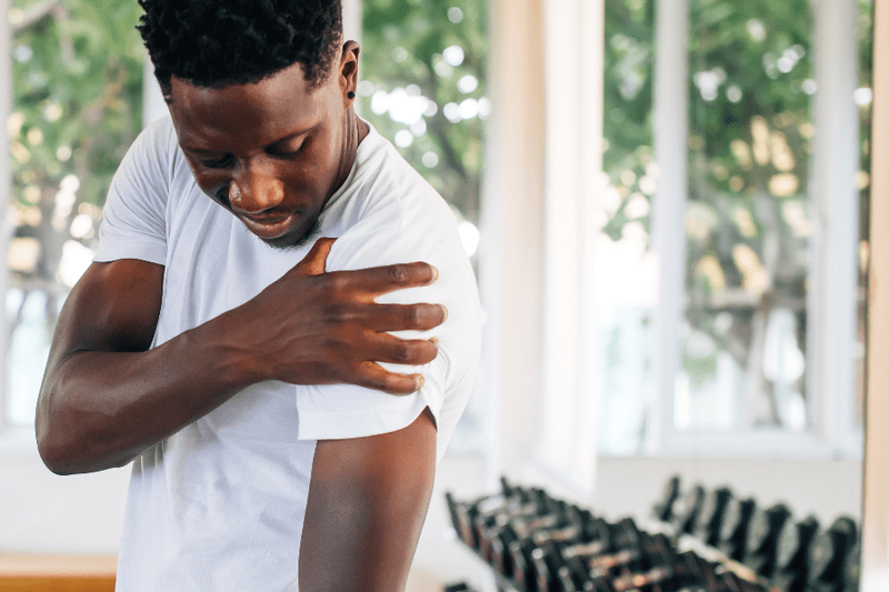 young man with rotator cuff injury