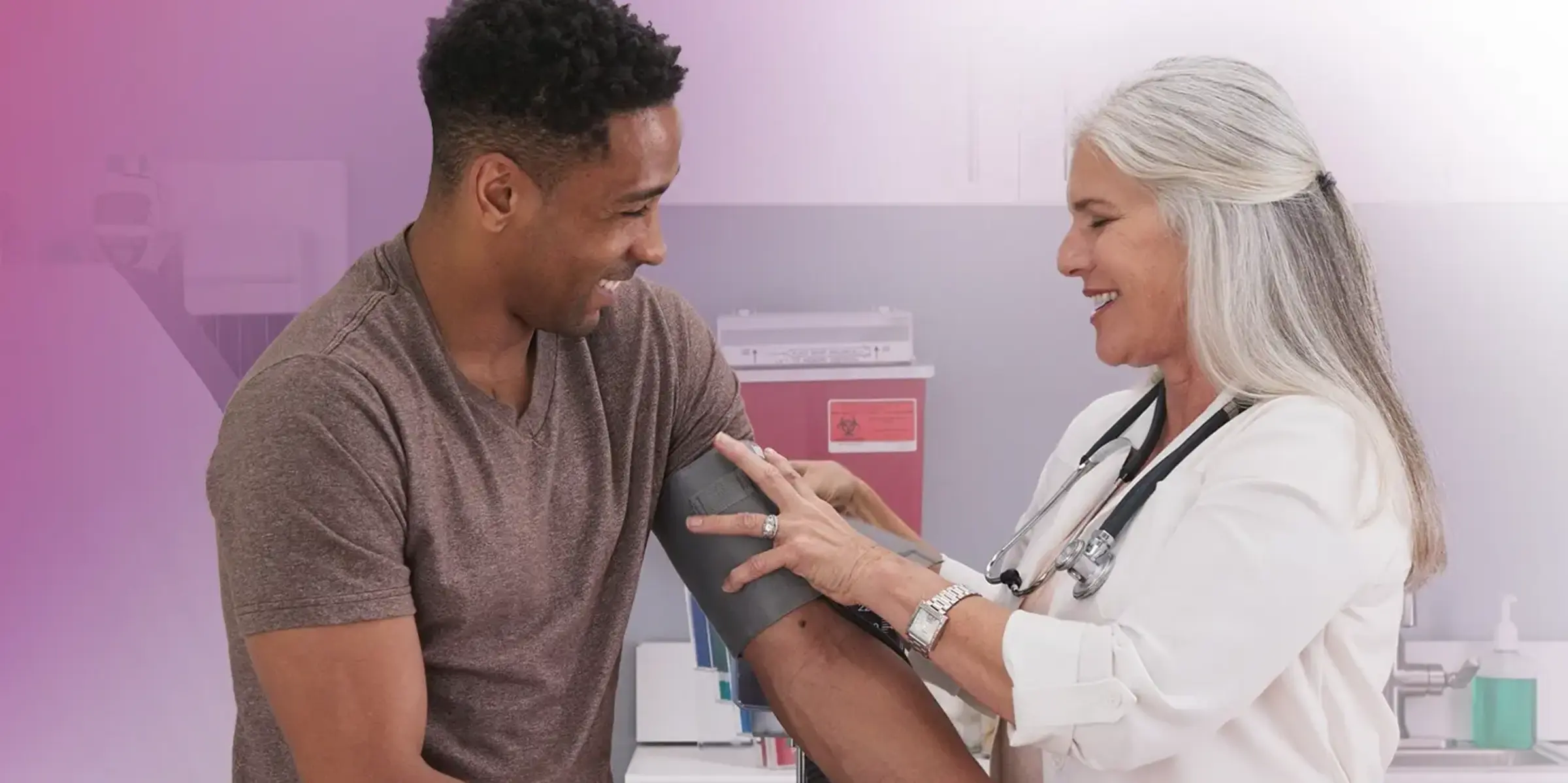young man with primary care doctor