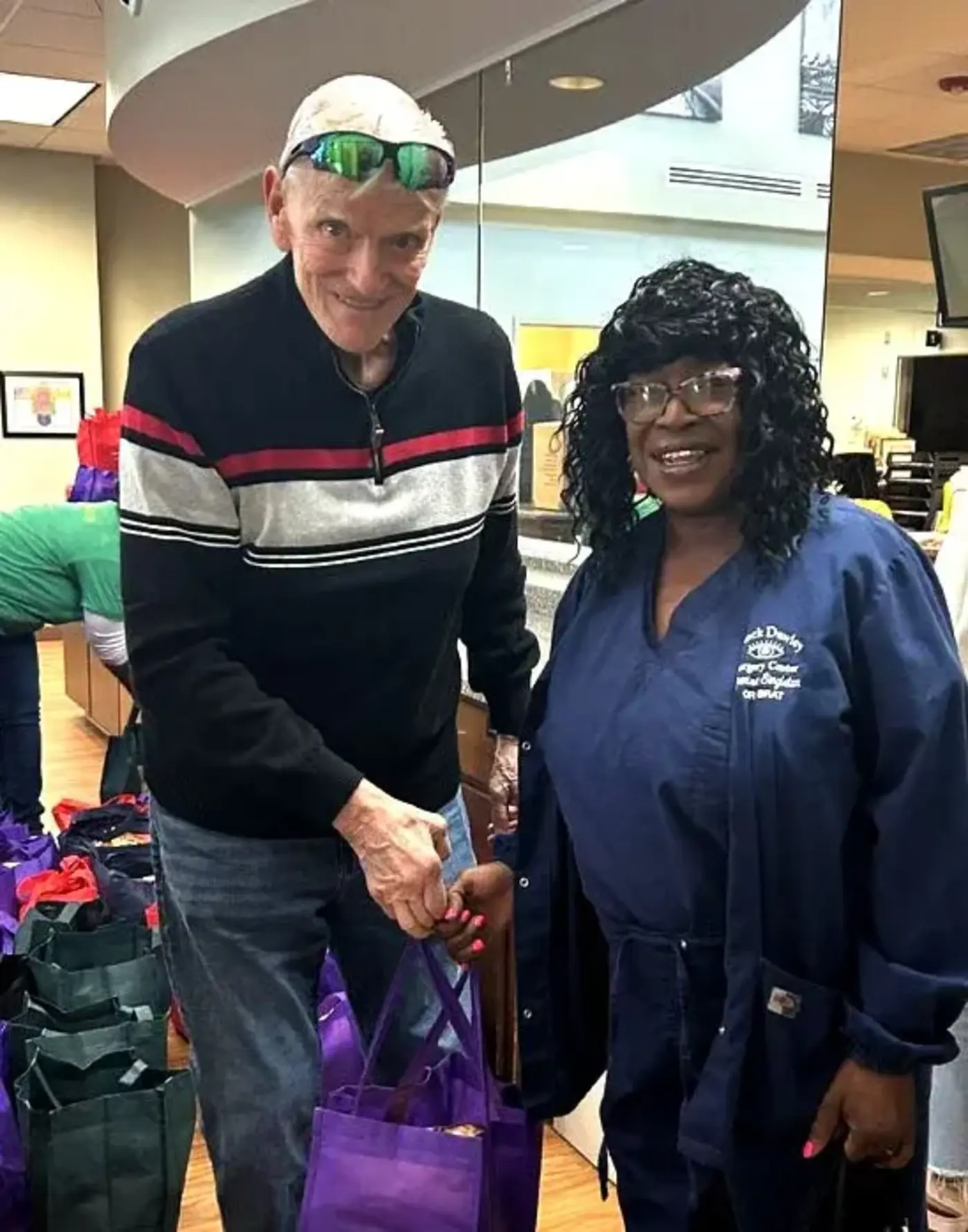 Greer worker gives food