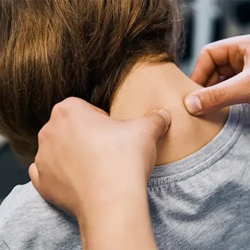 Doctor checks neck