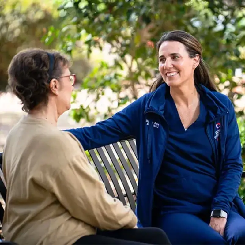 Nurse and patient outside