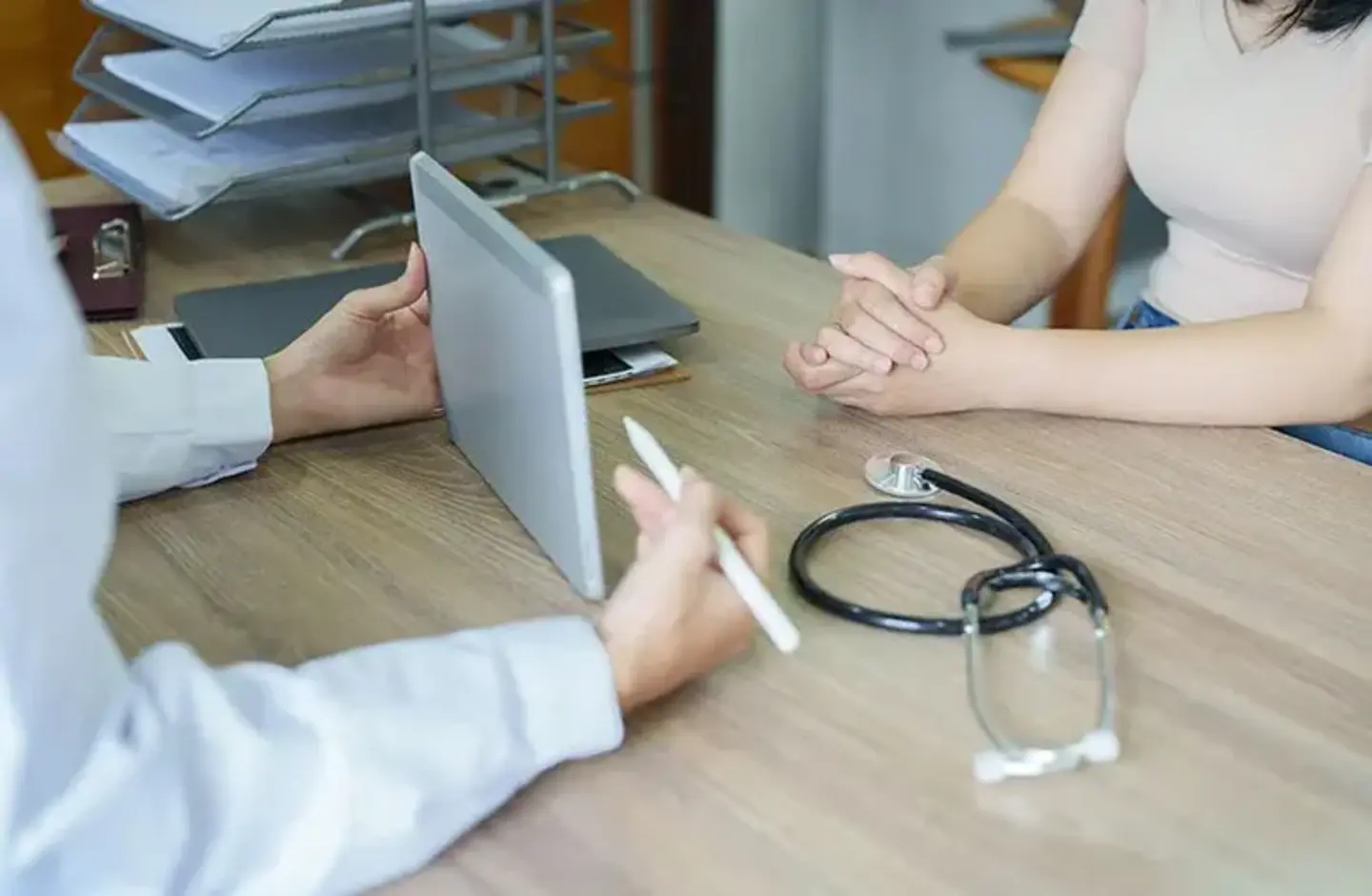 Doctor shows patient ipad