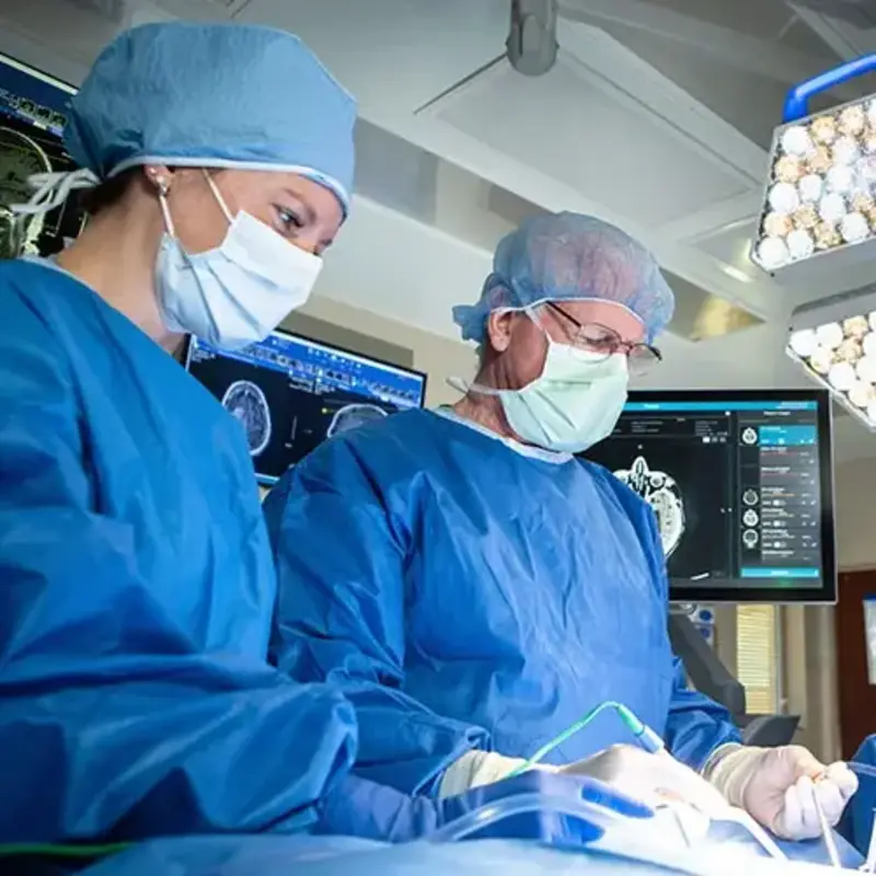 Surgeons operate