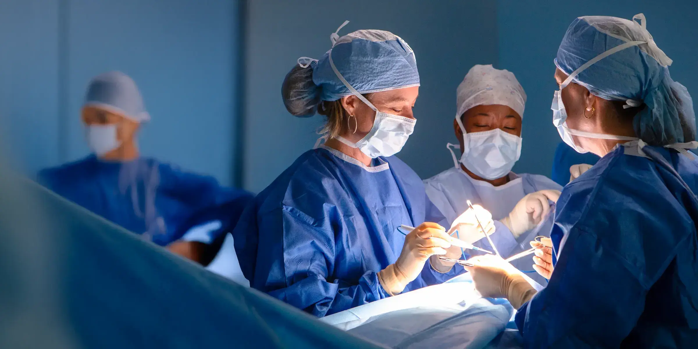 Woman surgeon in operating room