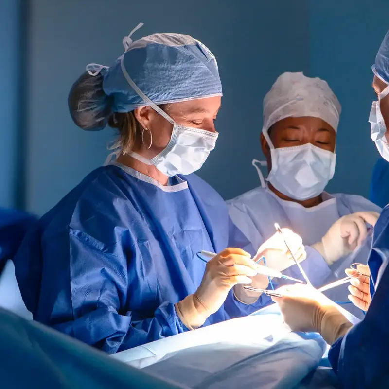 Woman surgeon in operating room