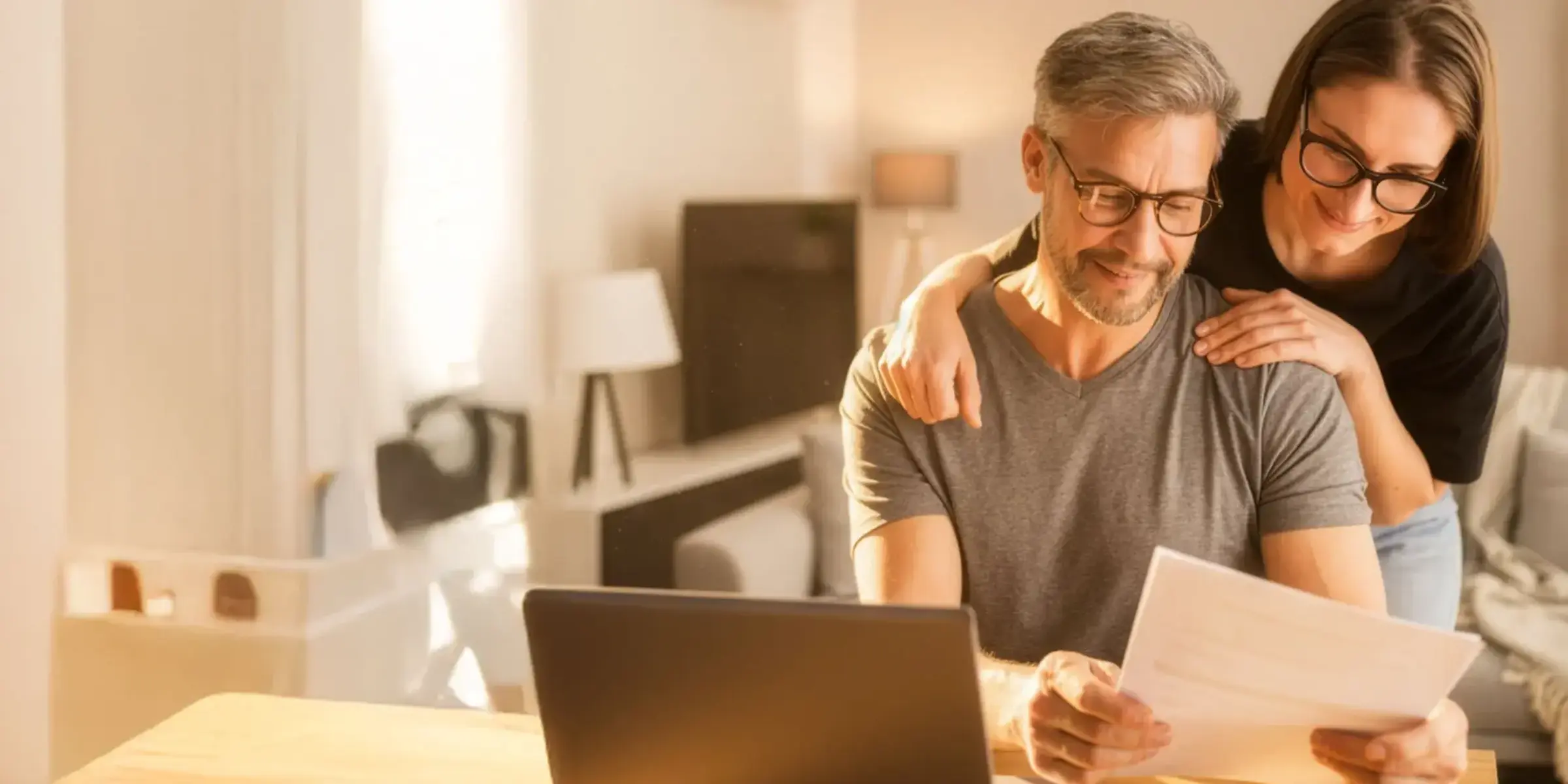 Man and woman look through paperwork