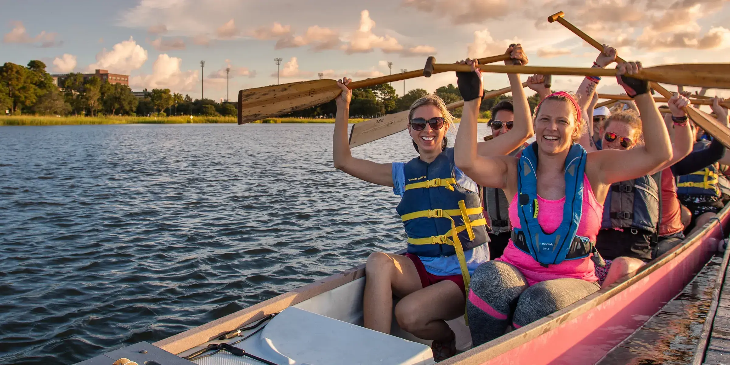 Women rowing on boat