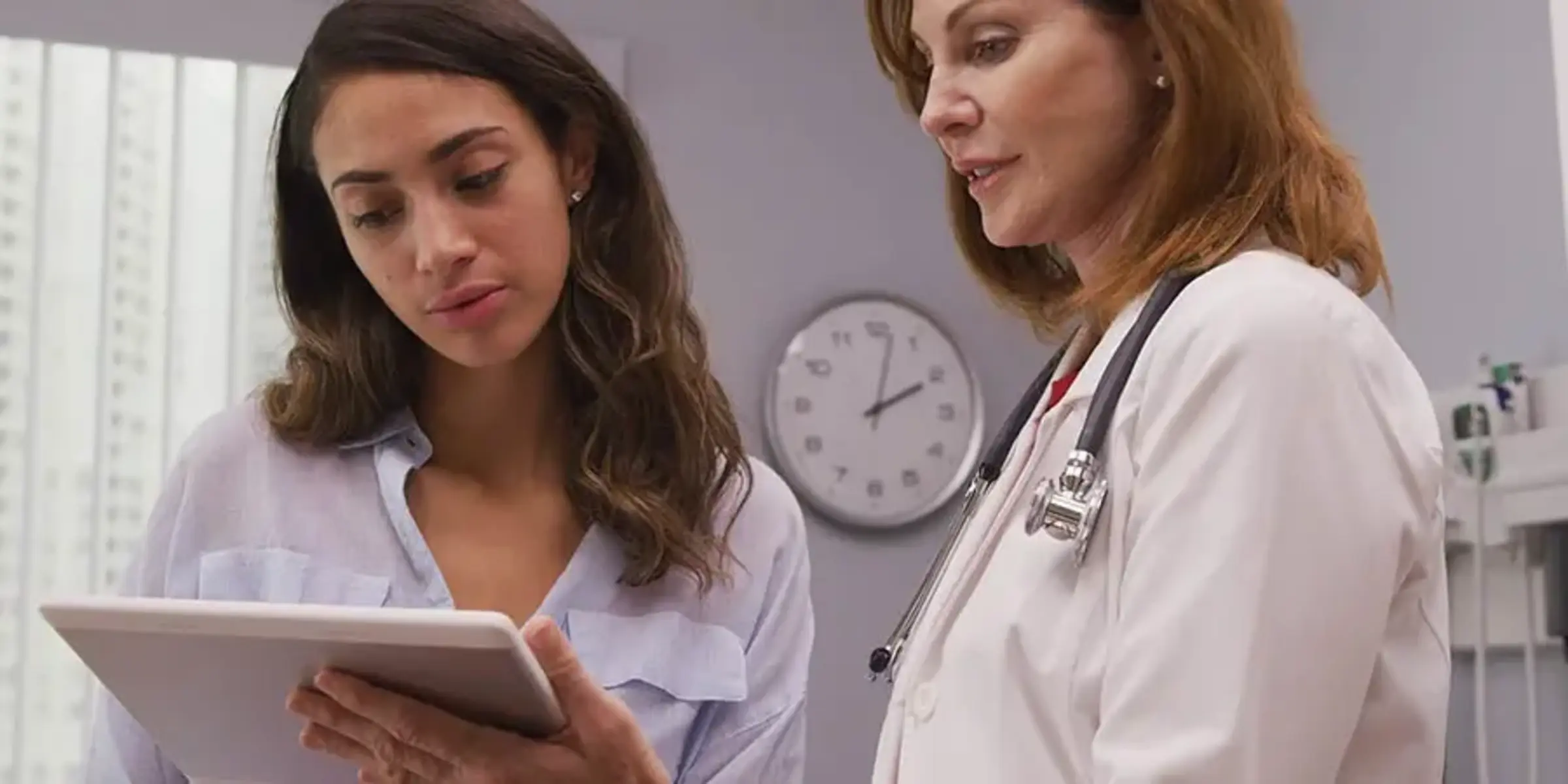 Hispanic woman first visit with doctor